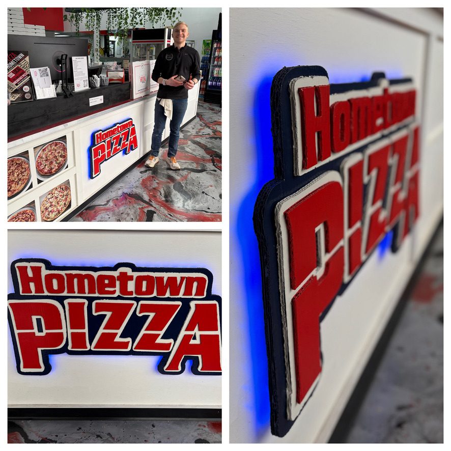 Custom Hometown Pizza LED-lit red and navy 3D sign on the shop counter: collage with a team member standing beside it, a front view, and a side close-up showing the blue glow