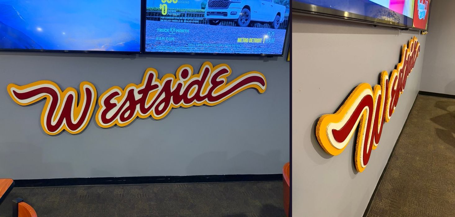 Custom Westside script wall sign in red, white and yellow layers for The Sports Bar Westside: front view and an angled view showing the layered depth