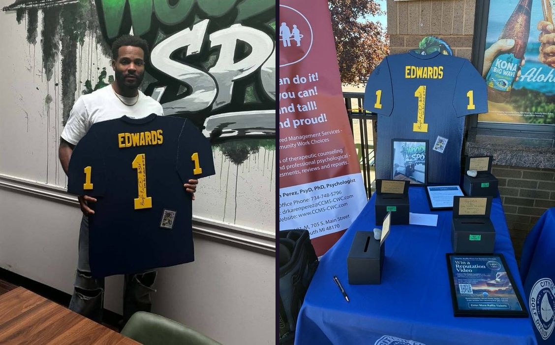 Braylon Edwards holding his custom tribute jersey cutout, and the jersey on display table, side by side