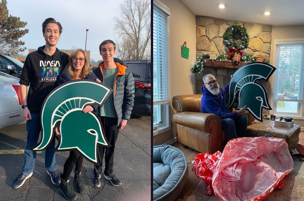 A mom and her two sons holding a custom Michigan State Spartan helmet cutout in a parking lot, and a man opening the helmet as a Christmas gift by the fireplace