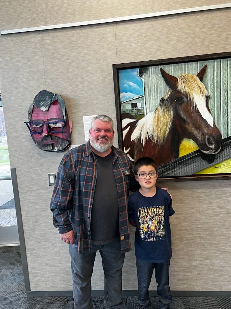 Tommy and Jeremy in front of Self Portrait and Finn