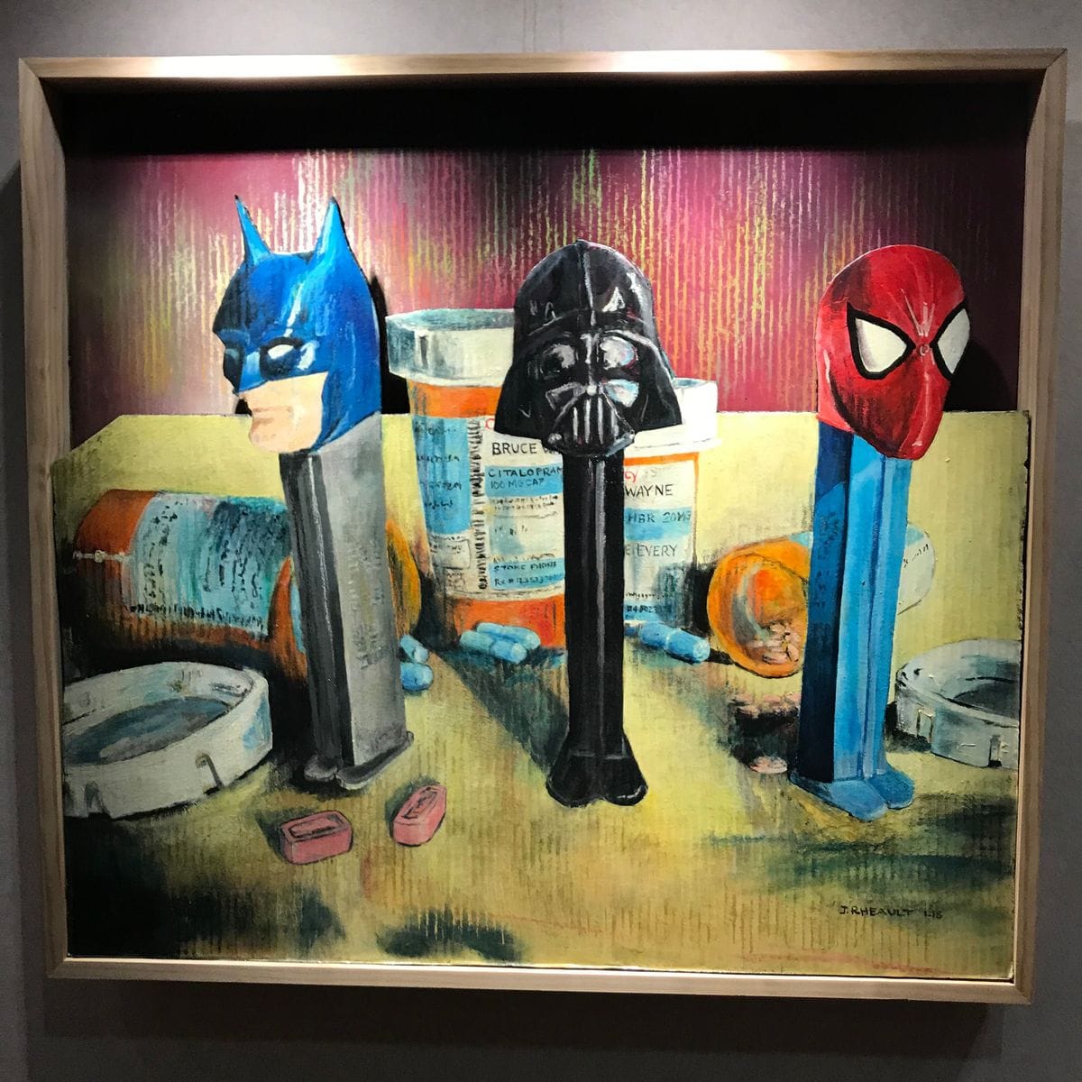 Pills & Pez 1 by Jeremy Rheault on the wall at The Village Theater