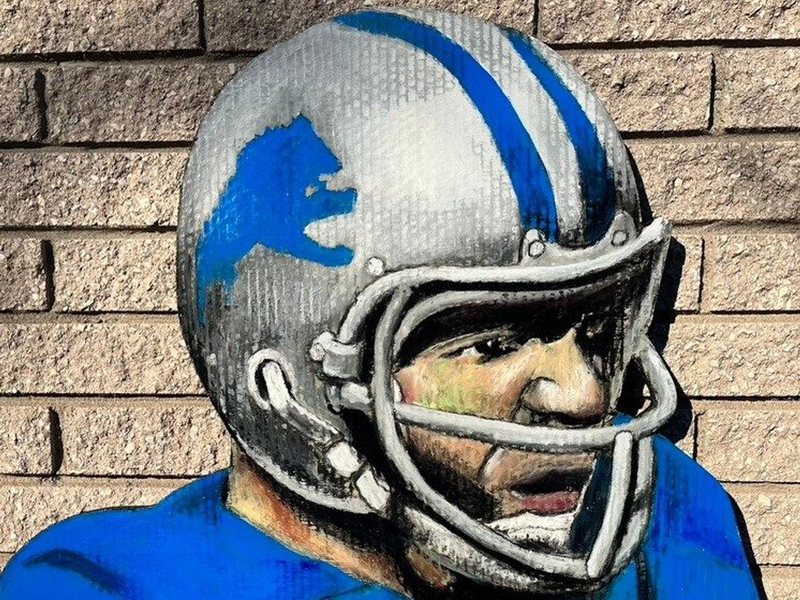 Hand-cut portrait of Joe Schmidt in his Lions helmet