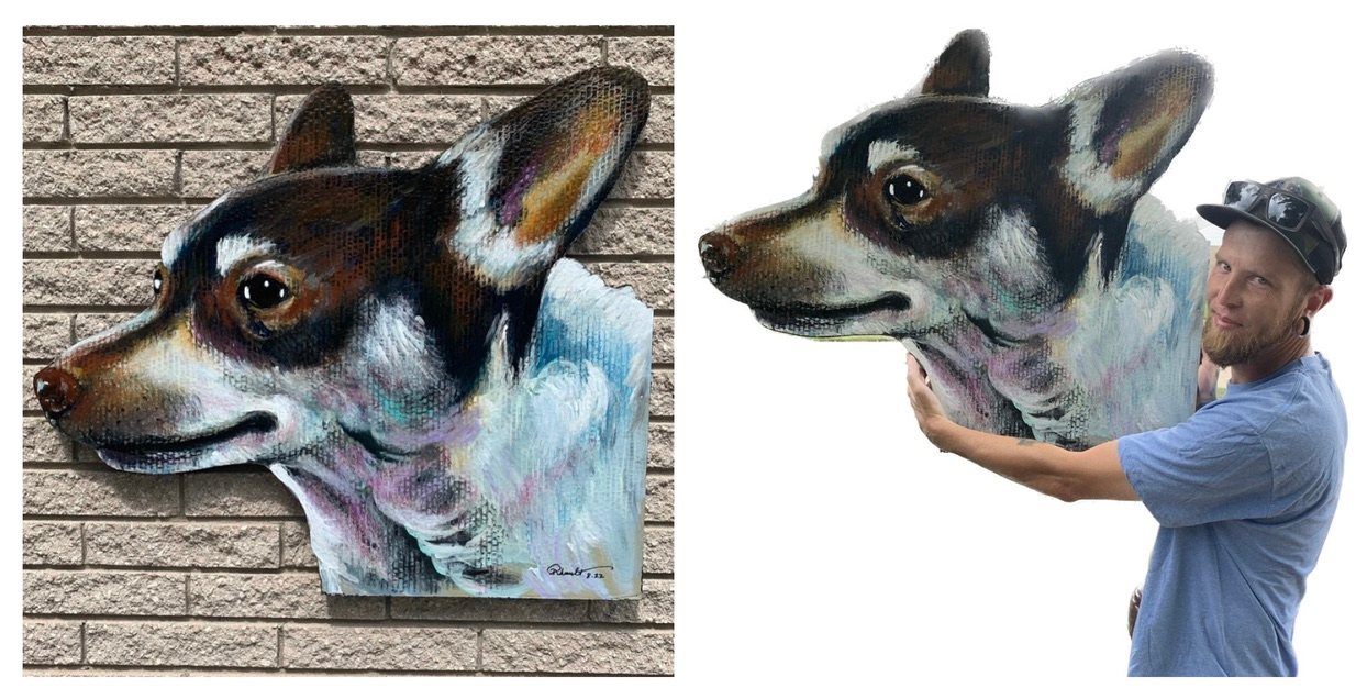 Hand-cut and hand-painted side profile portrait of Big Guy, a brown, black and white dog with big ears: on a brick wall, and held by the customer