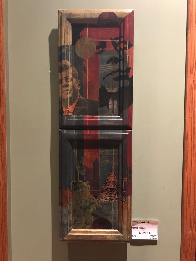Tall framed two-panel collage in red, black and tan with a portrait, silhouettes and a pyramid